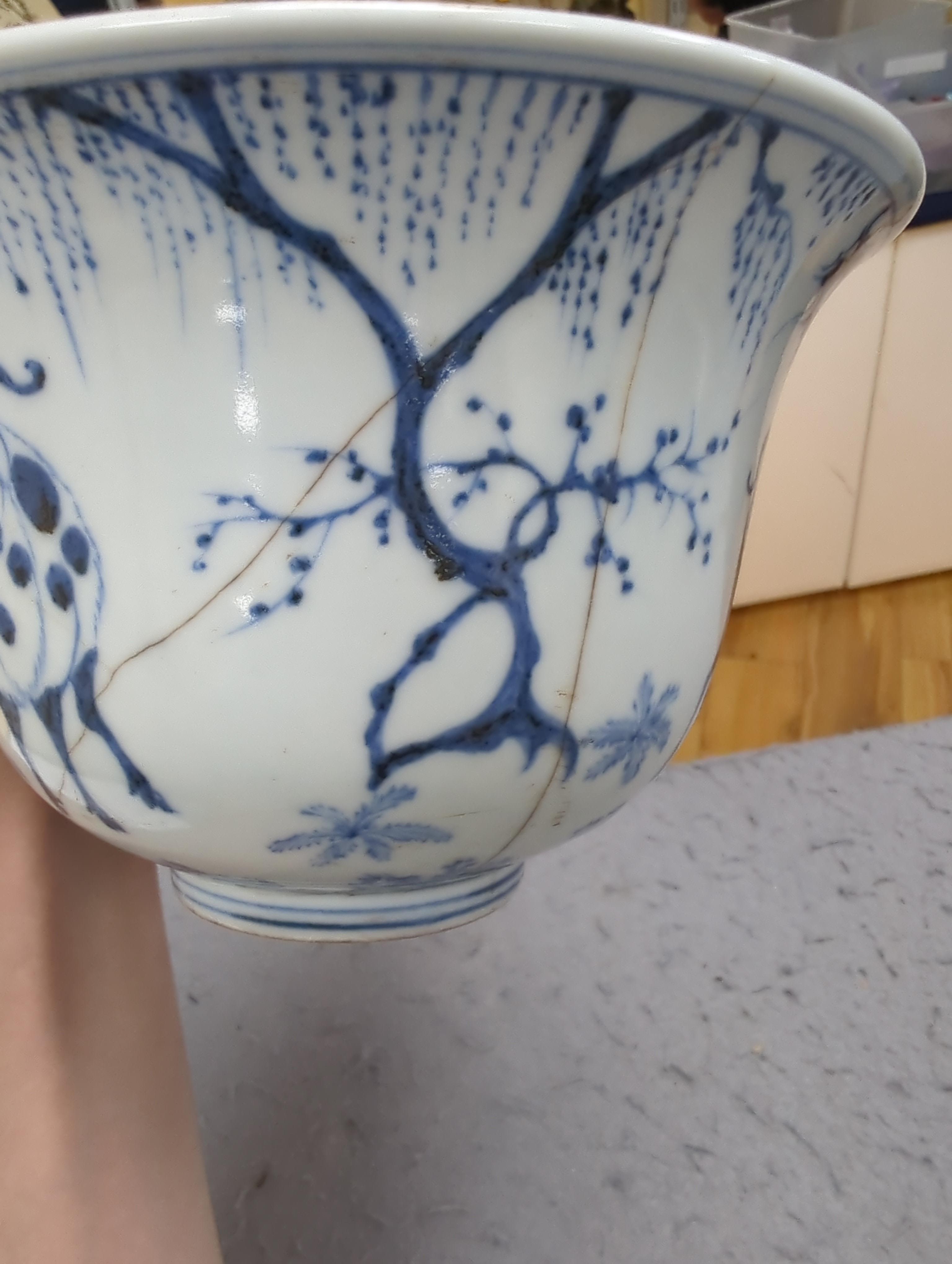 A Chinese blue and white footed bowl, decorated with animals in a landscape, 17cm in diameter